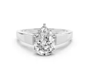 Pear Cut Diamond Solitaire Engagement Ring Set in Silver with Prong Setting and Tapered Band