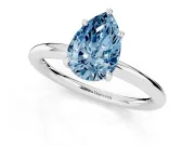 Fancy Blue Pear Cut Diamond Solitaire Ring Set in Silver with Thin Band and Prong Setting