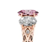 Fancy Pink Oval Cut Diamond Three-Stone Ring Set in Rose gold with Braided Band