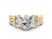 Three-Stone Heart Cut Diamond Channel Set Ring Set in Yellow gold with Bar Prongs