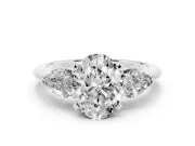 Three-Stone Oval Cut Diamond Ring Set in White gold with Pear Side Stones and Prong Setting