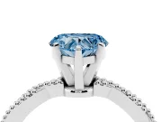 Fancy Blue Heart Cut Diamond Solitaire Ring Set in Platinum with Twisted Band and Bead Prong Setting