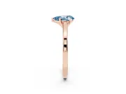 Fancy Blue Pear Cut Diamond Solitaire Ring Set in Rose gold with Prong Setting and Classic Band