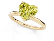Fancy Yellow Heart Cut Diamond Solitaire Ring Set in Yellow gold with Thin Band and Prong Setting