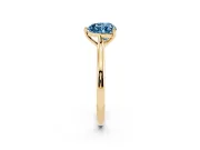 Fancy Blue Heart Cut Diamond Solitaire Ring Set in Yellow gold with Cathedral Band and Prong Setting