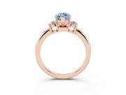 Fancy Blue Three-Stone Marquise Cut Diamond Ring Set in Rose gold with Prong Setting and Plain Band