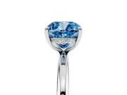Fancy Blue Cushion Cut Diamond Solitaire Ring Set in White gold with Thin Band and Prong Setting
