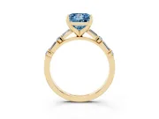 Fancy Blue Princess Cut Diamond Solitaire Set in Yellow gold with Side Baguettes and Channel Set Band