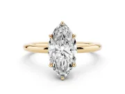 Marquise Cut Diamond Solitaire Ring Set in Yellow gold with Thin Band and Prong Setting