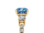 Fancy Blue Three-Stone Cushion Cut Diamond Pavé Band Ring Set in Yellow gold with Prong Setting
