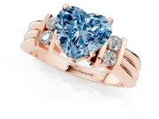 Fancy Blue Three-Stone Heart Cut Diamond Channel Set Ring Set in Rose gold with Bar Prongs
