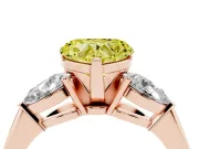 Fancy Yellow Three-Stone Heart Cut Diamond Ring Set in Rose gold with Pear Side Stones and Prong Setting