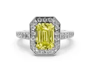 Fancy Yellow Emerald Cut Diamond Halo Pavé Engagement Ring Set in Platinum with Bezel Setting