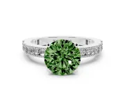 Fancy Green Round Cut Diamond Solitaire Ring Set in Platinum with Slim Pavé Band and Prong Setting
