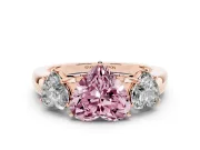 Fancy Pink Heart Cut Diamond Three-Stone Ring Set in Rose gold with Bold Center and Classic Band