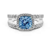 Fancy Blue Cushion Cut Diamond Halo Ring Set in Platinum with Pavé Split Shank and Prong Setting