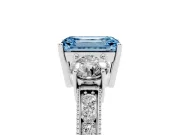 Fancy Blue Emerald Cut Diamond Three-Stone Ring Set in White gold with Round Side Stones and Pavé Band