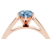 Fancy Blue Pear Cut Diamond Solitaire Engagement Ring Set in Rose gold with Prong Setting and Tapered Band