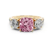 Fancy Pink Cushion Cut Diamond Three-Stone Ring Set in Yellow gold with Pavé Band