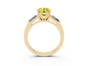 Fancy Yellow Round Cut Diamond Solitaire Ring Set in Yellow gold with Tapered Baguette Side Stones and Prong Setting