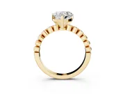 Heart Cut Diamond Solitaire Engagement Ring Set in Yellow gold with Bezel Accents on Beaded Band