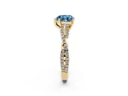 Fancy Blue Heart Cut Diamond Solitaire Engagement Ring Set in Yellow gold with Twisted Pavé Band and Prong Setting