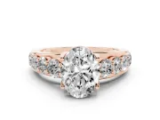 Oval Graduated Side Stone Engagement Ring Setting | Shared Prong Rails | Rose Gold