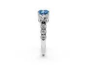 Fancy Blue Cushion Cut Diamond Three-Stone Ring Set in Platinum with Pavé Band