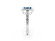 Fancy Blue Emerald Cut Diamond Halo Pavé Engagement Ring Set in Platinum with Bezel Setting