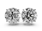 Round Cut Diamond Solitaire Stud Earrings Set in Platinum with Basket Setting