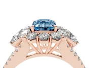 Fancy Blue Emerald Cut Diamond Halo Split Shank Engagement Ring Set in Rose gold with Prong-Held Center Stone