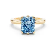 Fancy Blue Radiant Cut Diamond Solitaire Engagement Ring Set in Yellow gold with Slim Tapered Solitaire Band