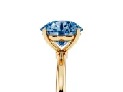 Fancy Blue Round Cut Diamond Solitaire Engagement Ring Set in Yellow gold with Thin Band and Prong Setting