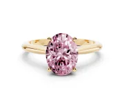Fancy Pink Oval Cut Diamond Solitaire Ring Set in Yellow gold with Prong Setting on a Plain Round Band