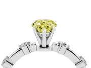 Fancy Yellow Pear Cut Diamond Solitaire Ring Set in White gold with Bezel Set Side Stones and Prong Setting