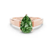 Fancy Green Pear Cut Diamond Solitaire Engagement Ring Set in Rose gold with Prong Setting and Tapered Band