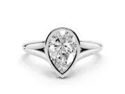 Bezel Set Pear Cut Diamond Solitaire Ring Set in Platinum with Tapered Band