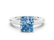 Fancy Blue Radiant Cut Diamond Solitaire Ring Set in White gold with Prong Setting and Classic Band