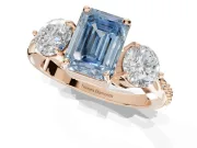 Emerald Cut Three Stone Engagement Ring Setting for a Fancy Blue Lab-Grown Diamond | Tapered Pave Band | Rose Gold
