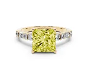 Fancy Yellow Princess Cut Diamond Solitaire Set in Yellow gold with Side Baguettes and Channel Set Band