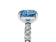 Fancy Blue Radiant Cut Diamond Pavé Solitaire Ring Set in White gold with Round Band and Prong Setting
