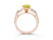 Fancy Yellow Round Cut Diamond Engagement Ring Set in Rose gold with Baguette Side Stones and Channel Set Band