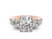 Three-Stone Radiant Cut Diamond Pavé Band Ring Set in Rose gold with Prong-Set Trio