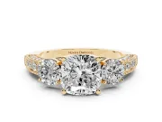 Cushion Cut Diamond Three-Stone Ring Set in Yellow gold with Round Side Stones and Pavé Band