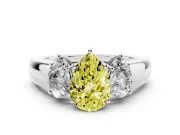Fancy Yellow Three-Stone Pear Cut Diamond Ring Set in Silver with Matching Prong Settings and Plain Band