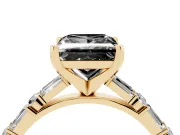 Fancy Black Princess Cut Diamond Solitaire Set in Yellow gold with Side Baguettes and Channel Set Band
