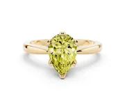 Fancy Yellow Pear Cut Diamond Solitaire Engagement Ring Set in Yellow gold with Slim Tapered Solitaire Band