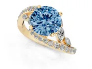 Fancy Blue Round Cut Diamond Solitaire Ring Set in Yellow gold with Pavé Twist Band and Secure Prong Setting