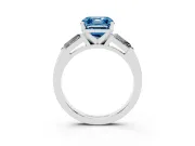 Fancy Blue Asscher Cut Diamond Solitaire Ring Set in Platinum with Tapered Baguette Side Stones and Prong Setting
