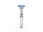 Fancy Blue Oval Cut Diamond Solitaire Ring Set in Platinum with Channel-Set Band and Prong Setting